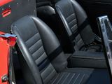 an image of a red sports car with black leather seats