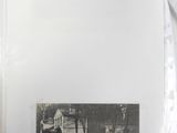 an old photo of a horse drawn carriage on the street