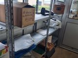 a room with a lot of boxes and boxes on the shelves