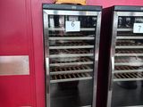 two wine coolers that are sitting next to each other