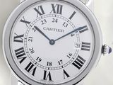 une image d'une montre avec des chiffres romains sur le cadran