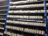 many shelves with boxes on them in a warehouse