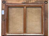 a close up of an old wooden frame with a picture on it