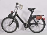 a black bicycle with a basket on the back of it