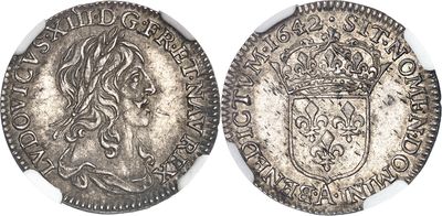 une pièce d'argent surmontée d'une couronne