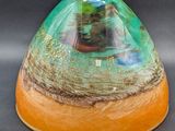 a picture of a glass dome with a tree inside of it