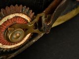 a close up of a person holding a pair of scissors