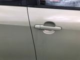 a car door handle that has a hole in it