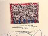 an image of a signed poster of a painting on a wall