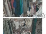 two pictures of a closet filled with clothes and a ironing board