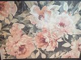 a picture of a painting of flowers on the wall