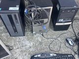 a lot of computer equipment that are on the ground