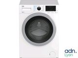 a close up of a washing machine on a white background
