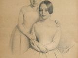 Sur une vieille photo, deux femmes en robe posent pour une photo