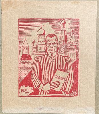 a stamp with a picture of a man holding a book