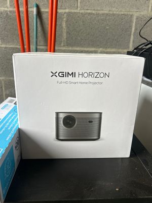 an open box of a camera sitting on top of a table