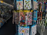 a display of stickers and other items in a store