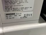 a machine that is sitting on the counter in the kitchen