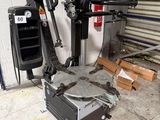 a machine that is sitting on the floor in a garage