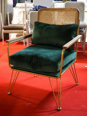 a chair that is sitting in the middle of a room