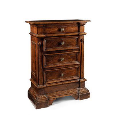 an image of a wooden chest of drawers on a white background