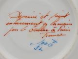 the plate has writing on it with a handwritten message on it