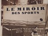 several old newspaper pages with pictures of soccer players on them