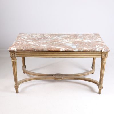 an image of a marble top coffee table on a white background