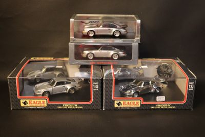 three toy cars that are sitting on top of each other