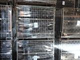 many cages that are stacked on top of each other