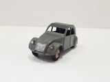 a toy car that is sitting on a white surface