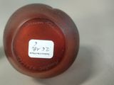 a bottle with a label on it sitting on a table