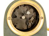 a clock that is sitting on top of a table
