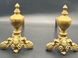pair of antique brass candlesticks with lion heads on bases