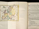 an open book with a map of europe on it