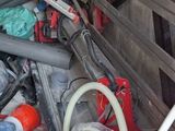 a pile of assorted items in the back of a truck
