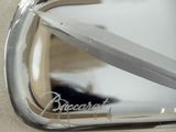 a toothbrush sitting in a clear container on a table
