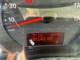 a close up of a speedometer in a car