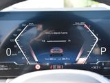 the dashboard of a car with a digital display on it