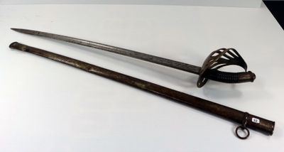 two old swords on a white table with a black background