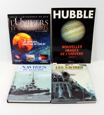 three books on a white table with a white background