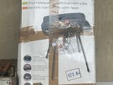 a cardboard box with a picture of a bbq grill on it