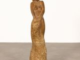 an image of a sculpture of a woman holding a child