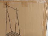 a cardboard box with a drawing of a swing on it
