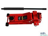 un gros plan d'un vérin hydraulique rouge sur fond blanc