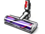 a close up of a vacuum cleaner on a white surface