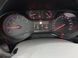 a close up of a car dashboard with a speedometer and gauges