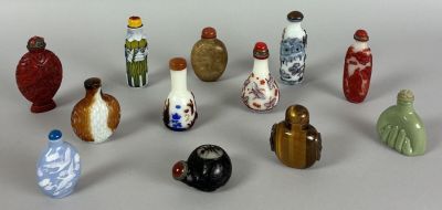 a lot of small vases that are sitting on a table