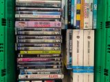 a lot of dvds in a green box