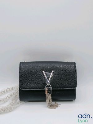 a close up of a black purse with a chain around it